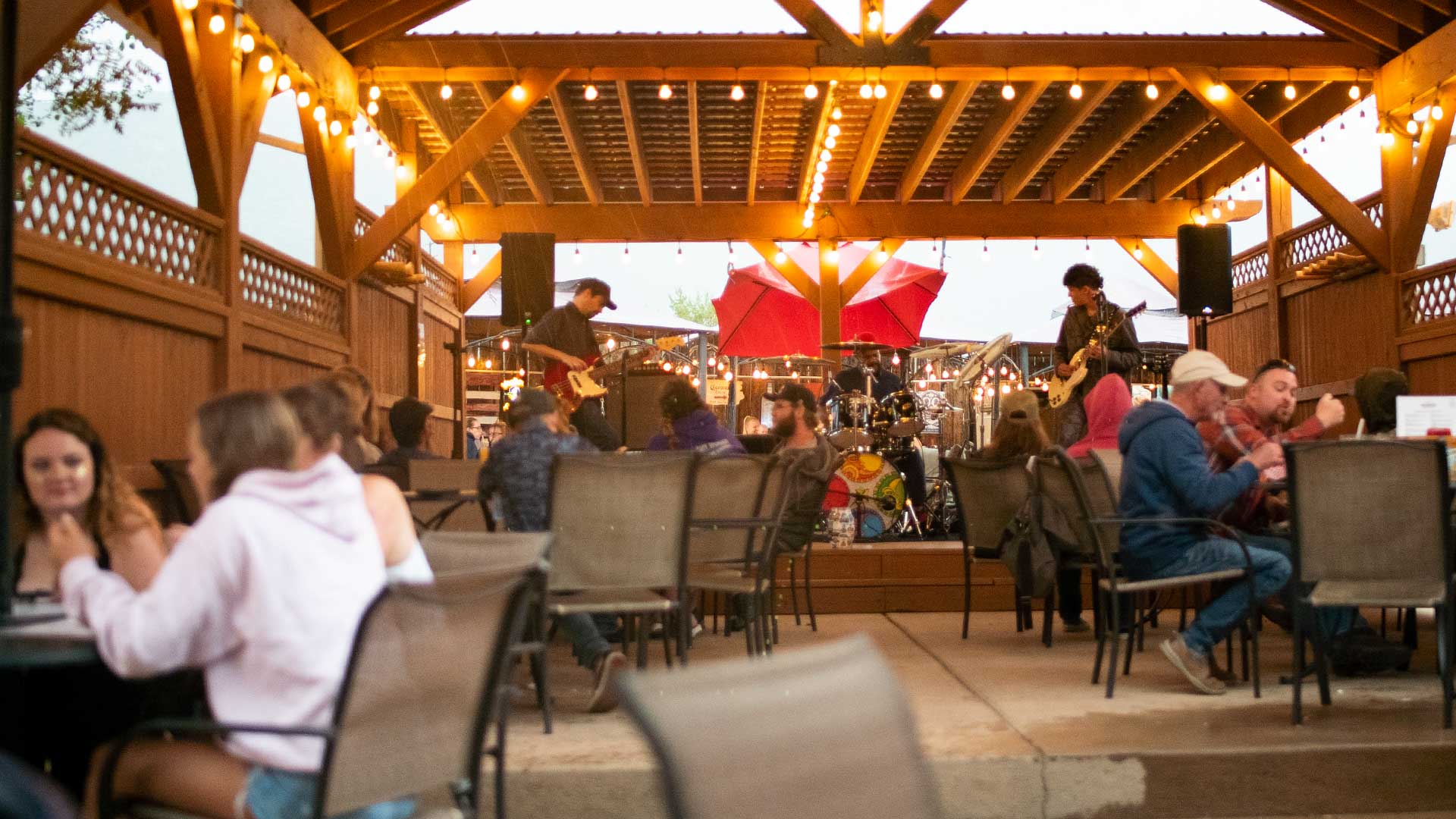 Whitewater Bar & Grill outdoor patio with volleyball courts